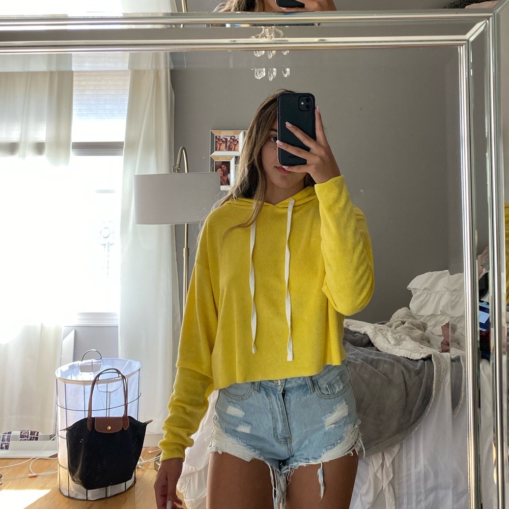 yellow sweatshirt